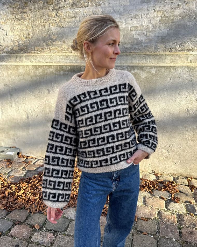 Closeup af mønsteret på beige og sort Athene Sweater