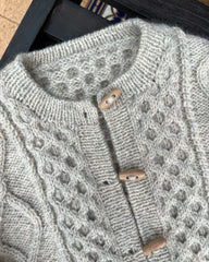 Closeup af Dagmar Jacket med duffelknapper