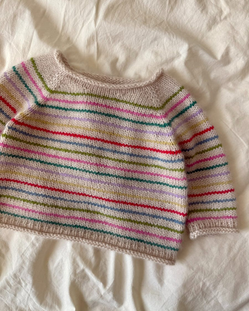 Liggende mangefarvet Frankie Sweater Baby