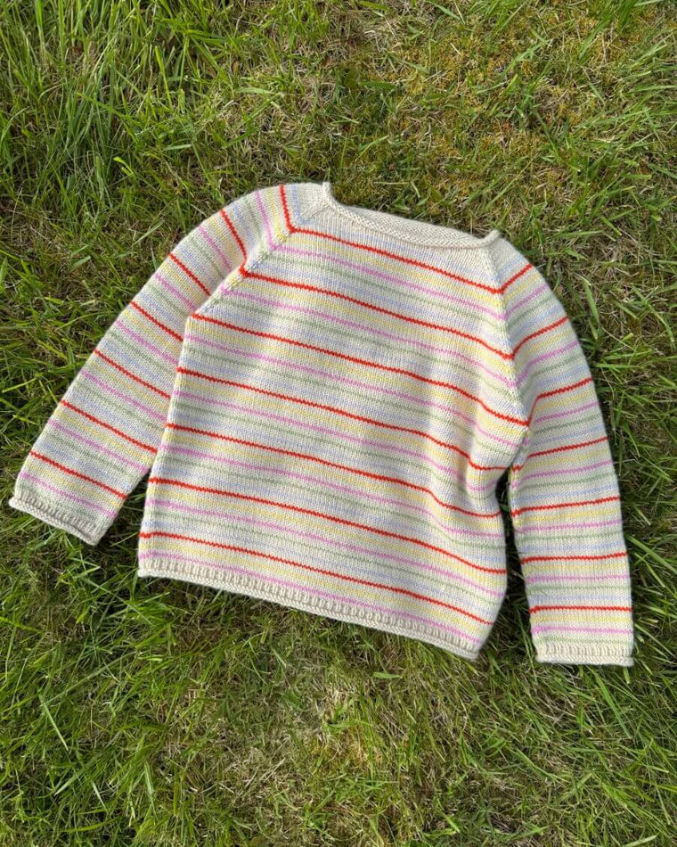 Closeup af mangefarvet Frankie Sweater Junior