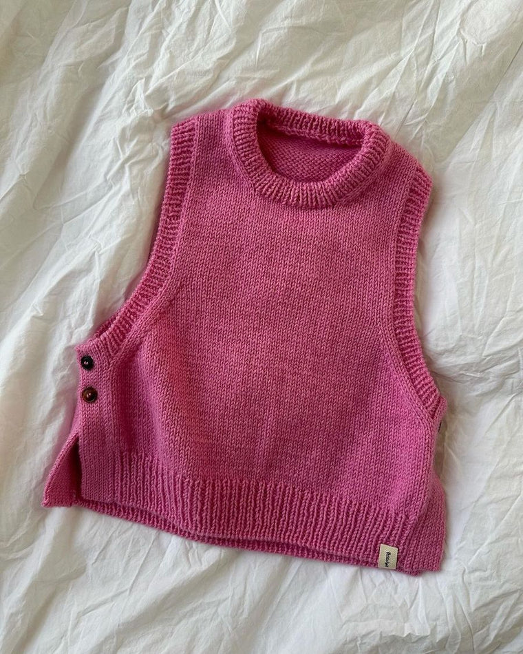 Barn iført pink Lulu Slipover Junior 