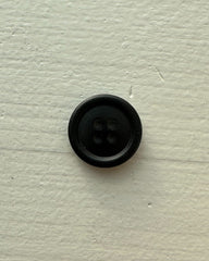 Énkelt sort galalit knap Ø 18 mm