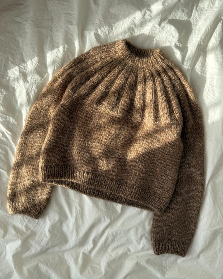 Detaljebillede af ærme på brun Sunday Sweater