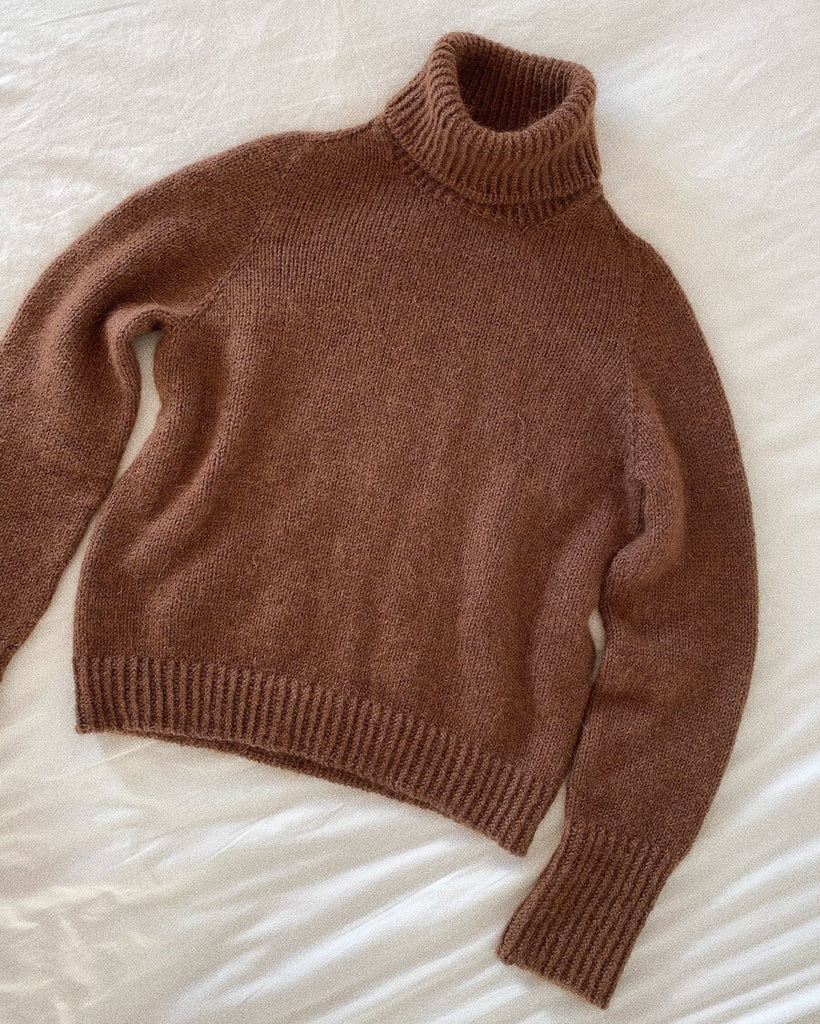 Brun Terrazzo Sweater på dyne