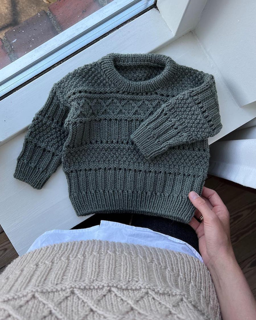 Liggende grønlig Ingrid Sweater Baby 