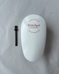 Lint Remover med børste ved siden af