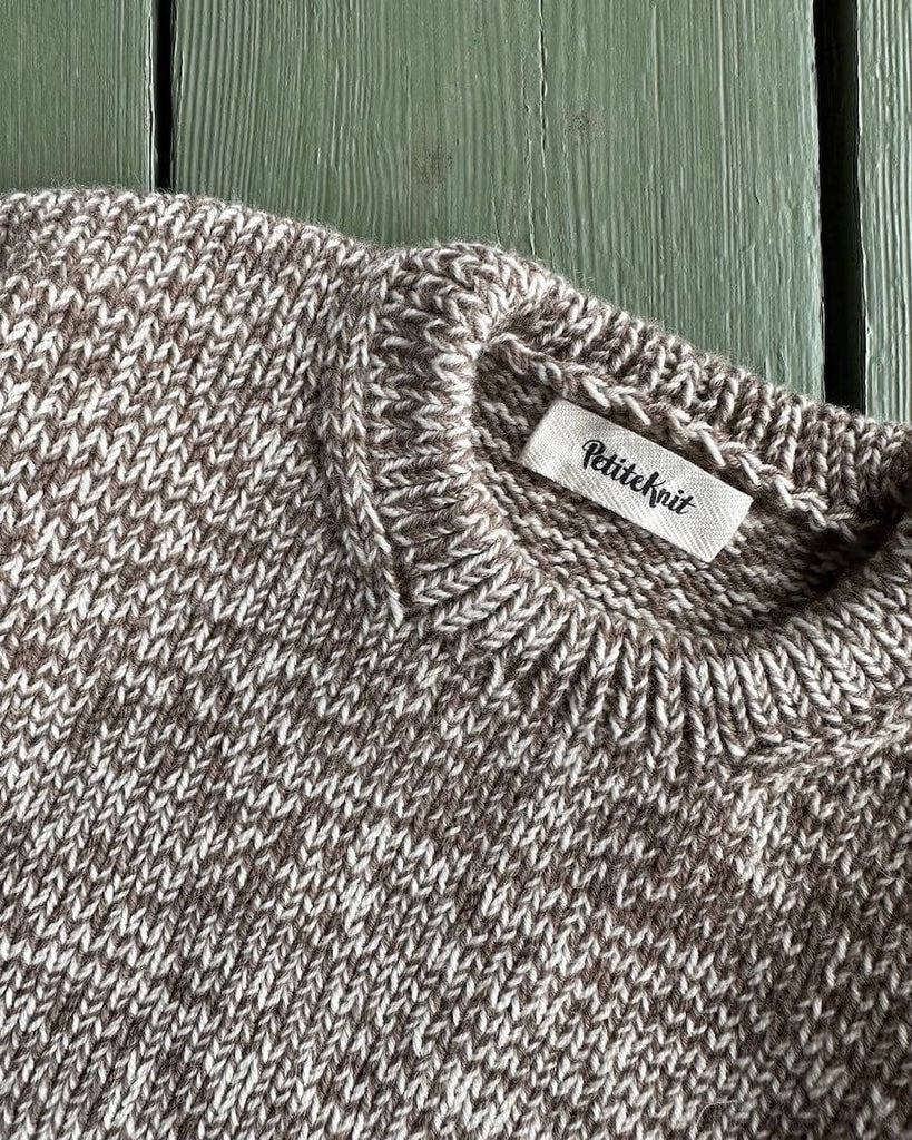 Detaljebillede af lysebrun og hvid Melange Sweater Baby