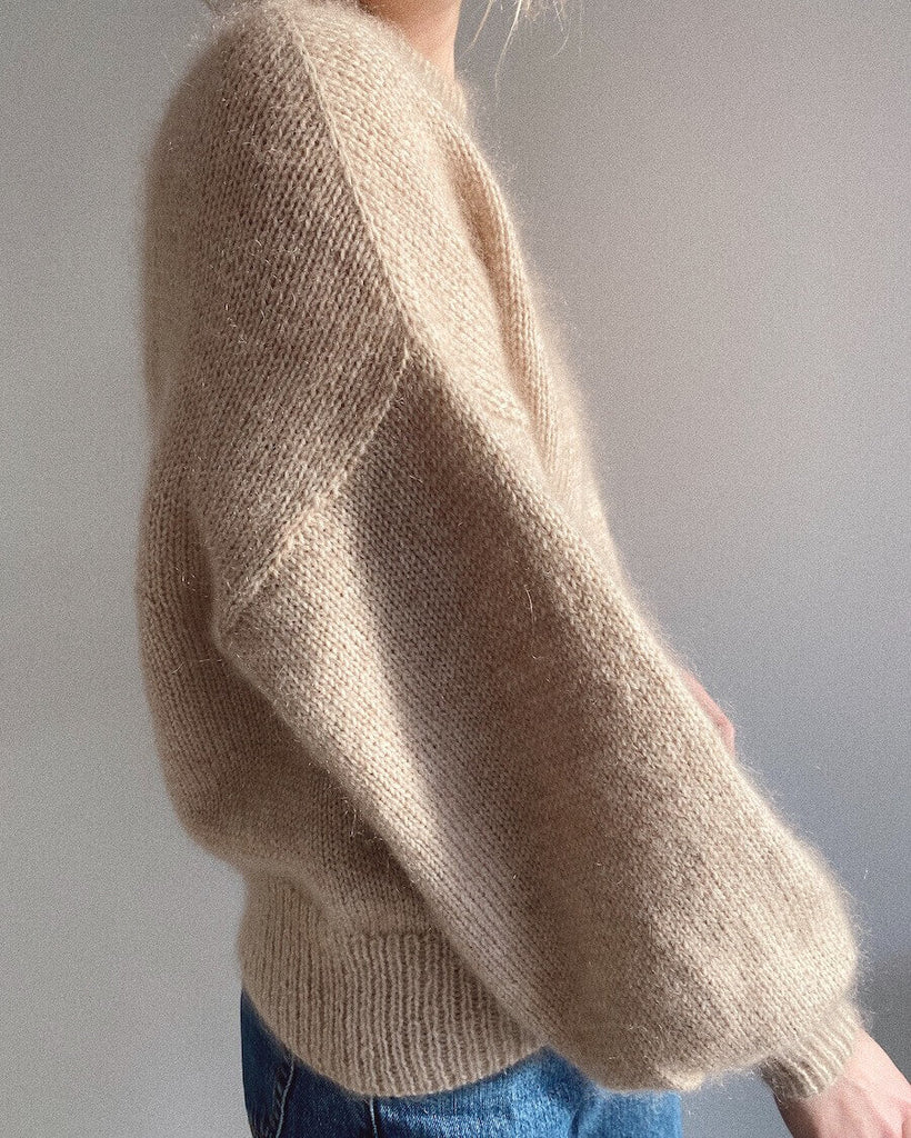 Closeup af lys Ballonsweater