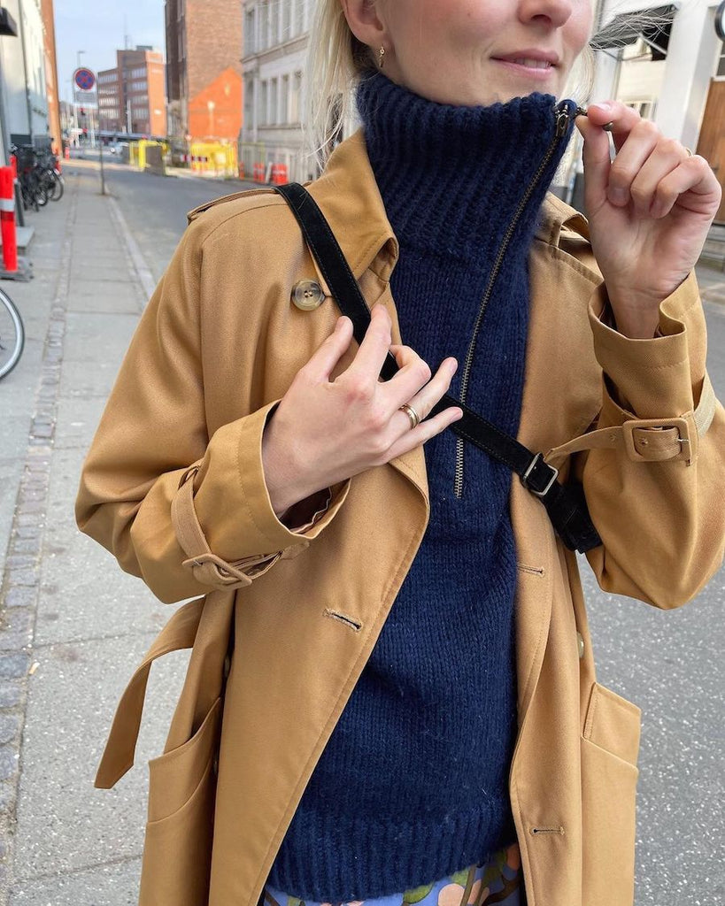 Kvinde iført blå Zipper Slipover